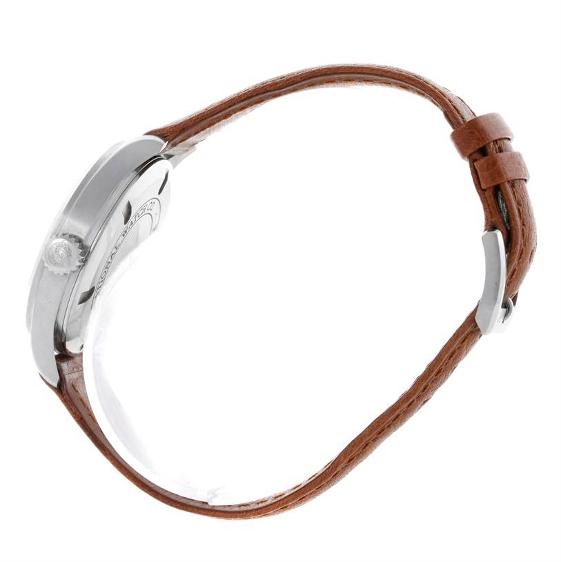 This image shows a side view of an IWC Pilot IW325602 Men's Stainless Steel Silver Dial IW325602 Men's Stainless Steel Silver Dial model watch, highlighting its case, crown, and leather strap.