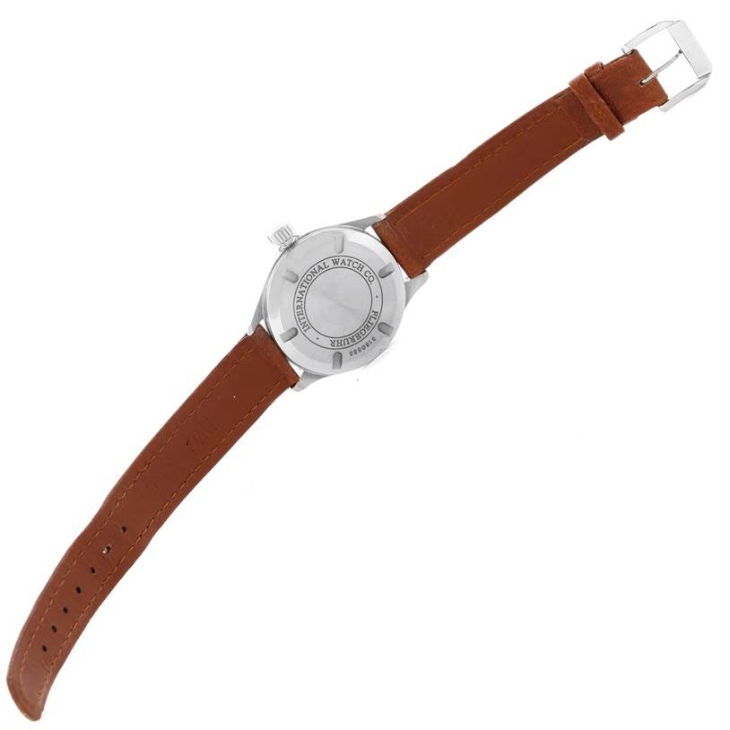 The image shows the back case and brown leather strap of the IWC Pilot IW325602 Men's Stainless Steel Silver Dial IW325602 Men's Stainless Steel Silver Dial model watch.