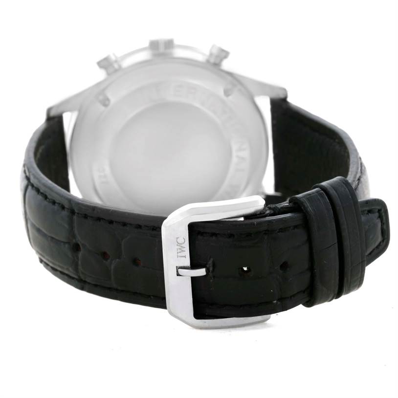 The image shows the back view of the IWC Portuguese IW371401 Men's Stainless Steel Silver Dial IW371401 Men's Stainless Steel Silver Dial watch, focusing on its black leather strap and clasp.