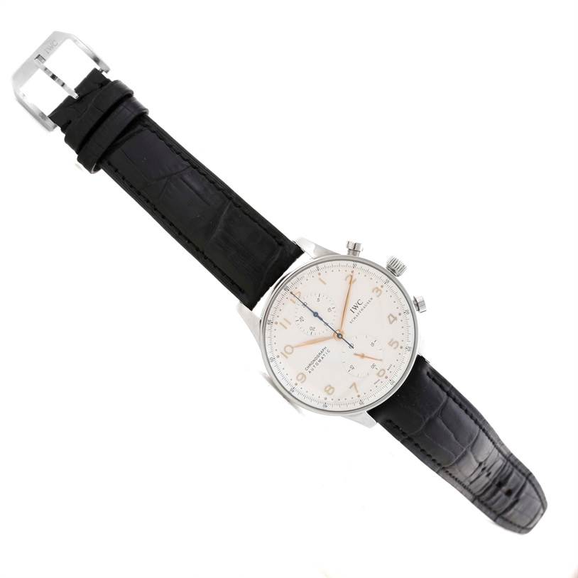 The IWC Portuguese IW371401 Men's Stainless Steel Silver Dial IW371401 Men's Stainless Steel Silver Dial model watch is shown at an angled view, featuring the black leather strap and silver case with a visible dial and buckle.