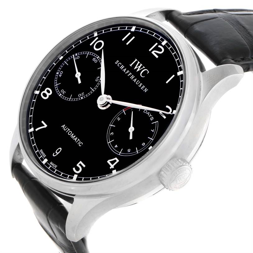 The image shows a close-up, angled view of the IWC Portuguese IW500109 Men's Stainless Steel Black Dial IW500109 Men's Stainless Steel Black Dial model watch, highlighting its black dial, crown, and strap.