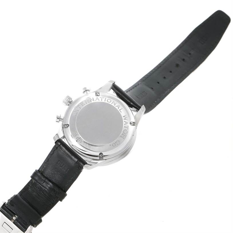 The image shows the backside and strap of an IWC Portuguese IW371447 Men's Stainless Steel Black Dial IW371447 Men's Stainless Steel Black Dial model watch, highlighting the case back and leather strap.