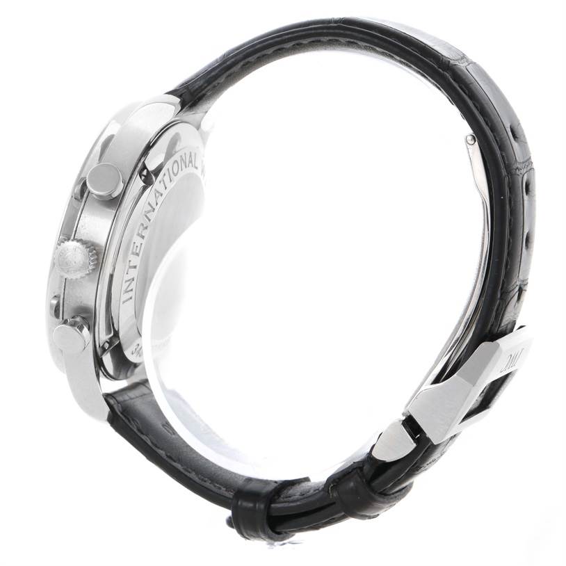 The image shows a side profile of an IWC Portuguese IW371447 Men's Stainless Steel Black Dial IW371447 Men's Stainless Steel Black Dial watch, highlighting the case, crown, pushers, and part of the leather strap.