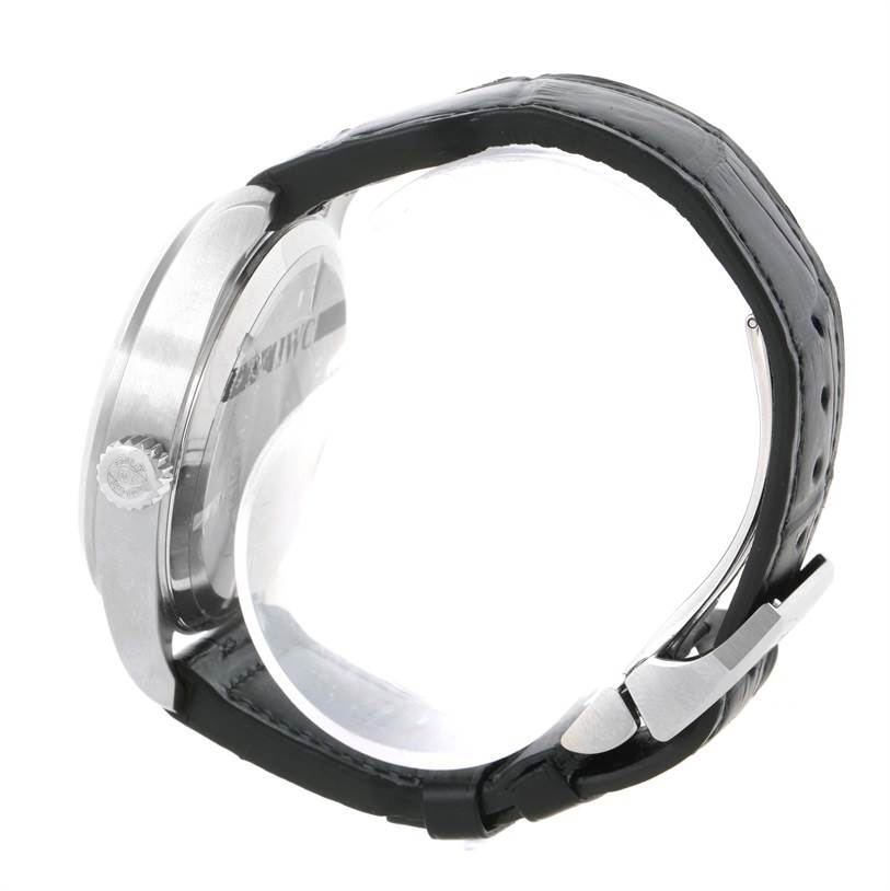 The image shows a side view of an IWC Pilot IWC3262-01 Men's Stainless Steel Black Dial IWC3262-01 Men's Stainless Steel Black Dial model watch, highlighting the crown, case, and leather strap with buckle.