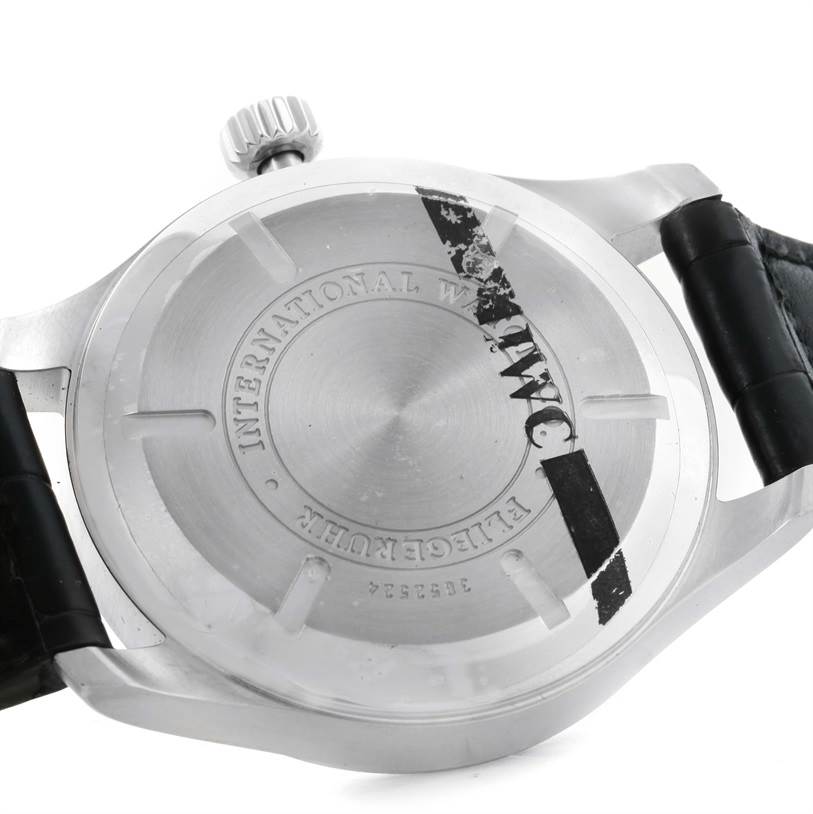 The image shows the back case and part of the leather strap of an IWC Pilot IWC3262-01 Men's Stainless Steel Black Dial IWC3262-01 Men's Stainless Steel Black Dial model watch, viewed from the rear angle.