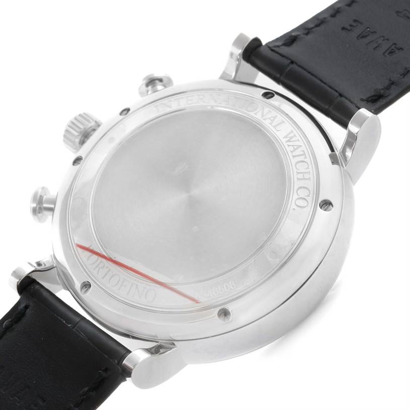 The image shows the back view of an IWC Portofino IW371447 Men's Stainless Steel Black Dial IW371447 Men's Stainless Steel Black Dial watch, displaying its case back, lugs, and part of the leather strap.