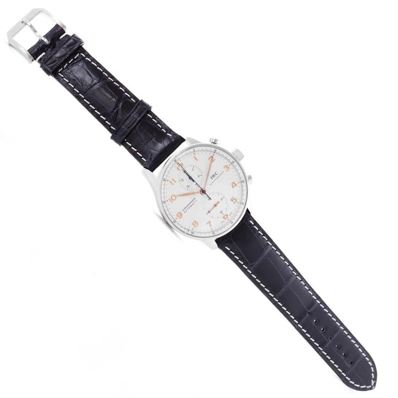 The image shows an IWC Portuguese IW371445 Men's Stainless Steel Silver Dial IW371445 Men's Stainless Steel Silver Dial model watch from a top-down angle, displaying the full face and leather strap.