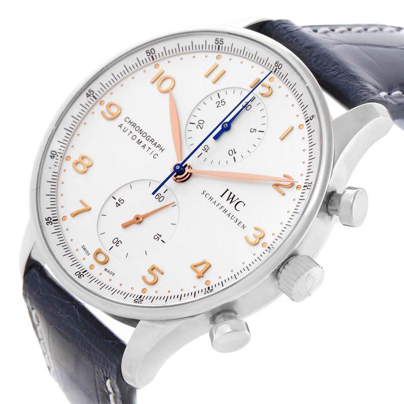 The watch, an IWC Portuguese IW371445 Men's Stainless Steel Silver Dial IW371445 Men's Stainless Steel Silver Dial model, is shown at an oblique angle showcasing its dial, crown, pushers, and leather strap.