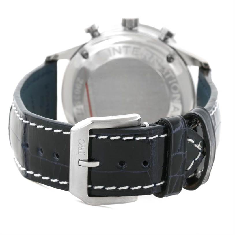 The image shows the back view of an IWC Portuguese IW371445 Men's Stainless Steel Silver Dial IW371445 Men's Stainless Steel Silver Dial model watch, highlighting its leather strap and buckle.