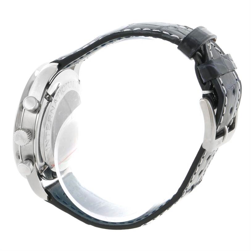 This side view of the IWC Portuguese IW371445 Men's Stainless Steel Silver Dial IW371445 Men's Stainless Steel Silver Dial model watch shows the case, crown, pushers, and strap with its buckle.