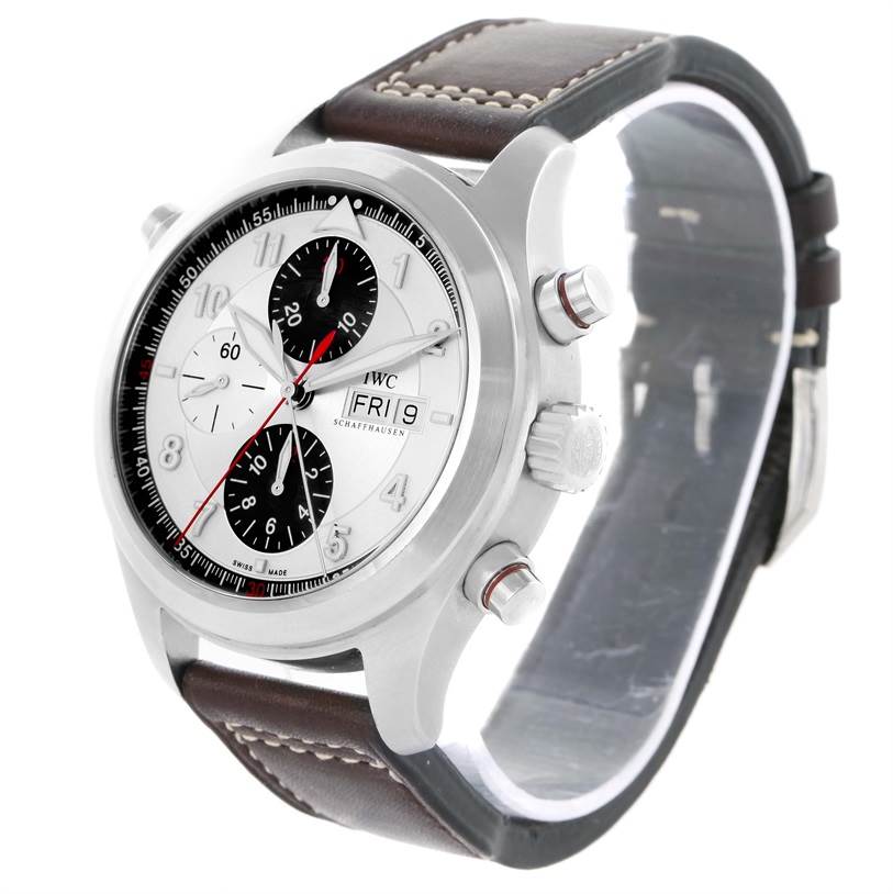 The image shows an angled view of the IWC Pilot IW371806 Men's Stainless Steel Silver Dial IW371806 Men's Stainless Steel Silver Dial model watch, displaying its face, crown, pushers, and part of the strap.