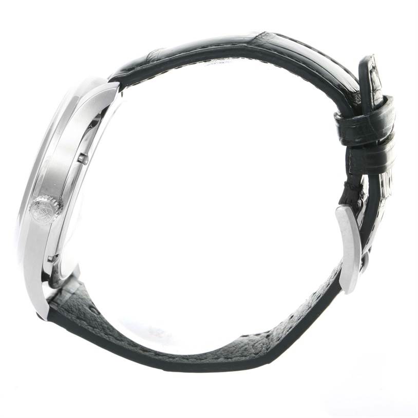 The image shows a side profile of an IWC Portuguese IW544401 Men's Stainless Steel Silver Dial IW544401 Men's Stainless Steel Silver Dial model watch, highlighting its case, crown, and leather strap.