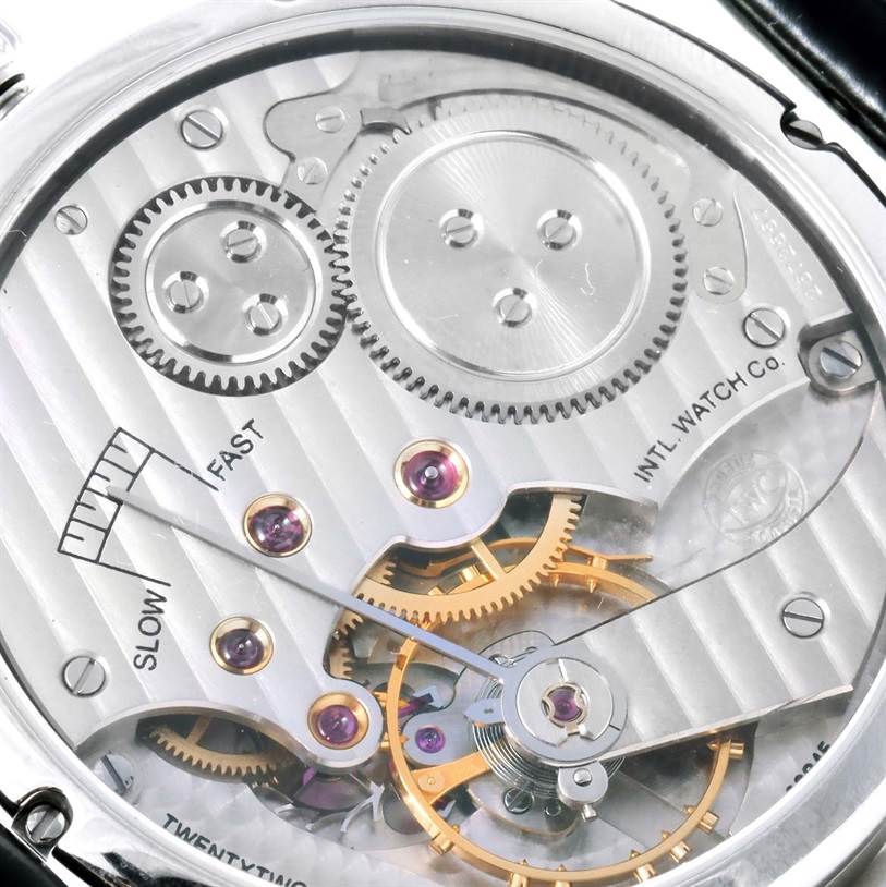 The image shows the intricate inner mechanisms and gears of the IWC Portuguese IW544401 Men's Stainless Steel Silver Dial IW544401 Men's Stainless Steel Silver Dial model watch from a close-up angle.