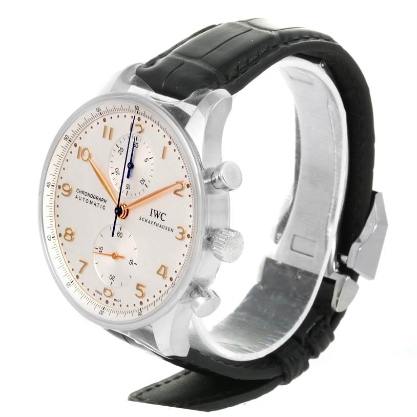 The IWC Portuguese IW371445 Men's Stainless Steel Silver Dial IW371445 Men's Stainless Steel Silver Dial model watch is shown from a three-quarter angle, displaying the face, crown, pushers, case, and leather strap.