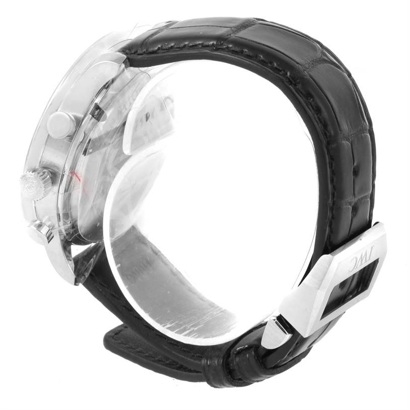 The image shows a side view of an IWC Portuguese IW371445 Men's Stainless Steel Silver Dial IW371445 Men's Stainless Steel Silver Dial watch, highlighting its crown, pushers, case, and leather strap with the IWC buckle.