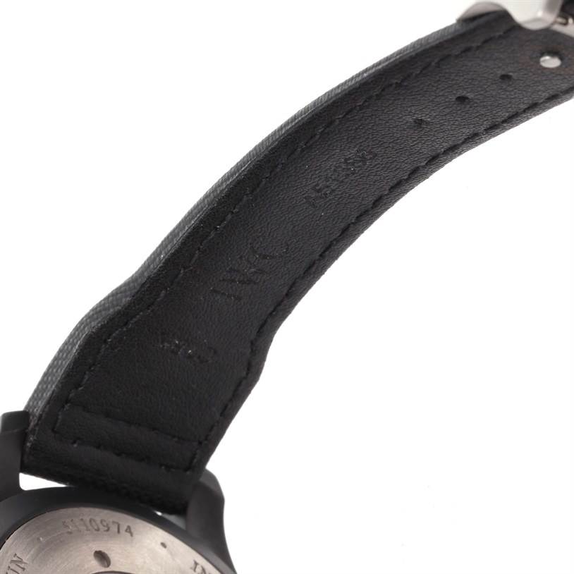 The image shows the back view of an IWC Pilot IW501901 Men's Titanium Black Dial IW501901 Men's Titanium Black Dial watch, focusing on the leather strap and part of the case's backside.
