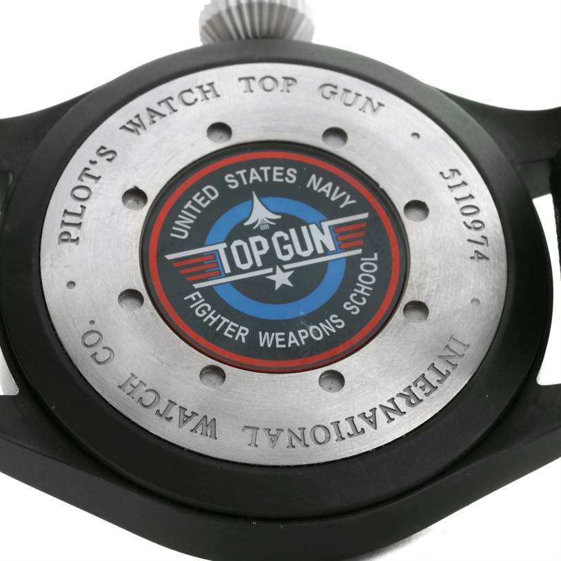 The image shows the case back of the IWC Pilot IW501901 Men's Titanium Black Dial IW501901 Men's Titanium Black Dial model watch featuring "Top Gun" insignia.