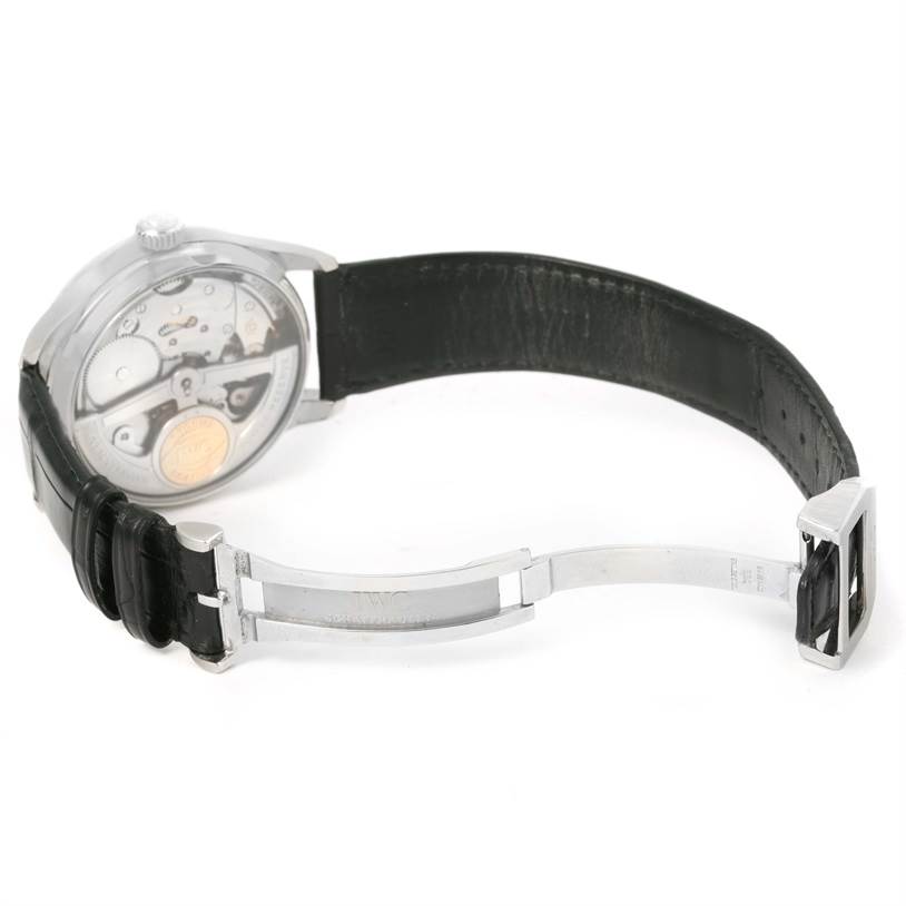 The image shows the back and strap of the IWC Portuguese IW500109 Men's Stainless Steel Black Dial IW500109 Men's Stainless Steel Black Dial watch, highlighting the transparent case back and deployment clasp.