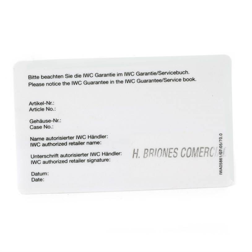 This image shows the warranty card for the Portuguese model by IWC, featuring information fields for article number, case number, and retailer details.