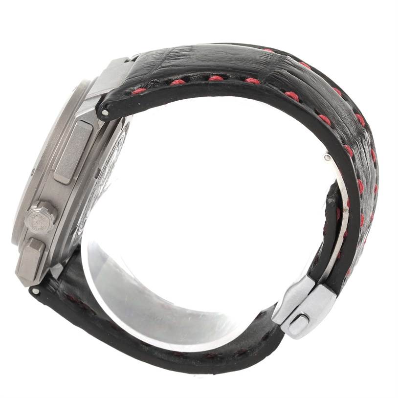 This side view of the IWC Ingenieur IW372504 Men
s Titanium Black Dial IW372504 Men
s Titanium Black Dial watch shows the case, crown, and strap with red stitching.