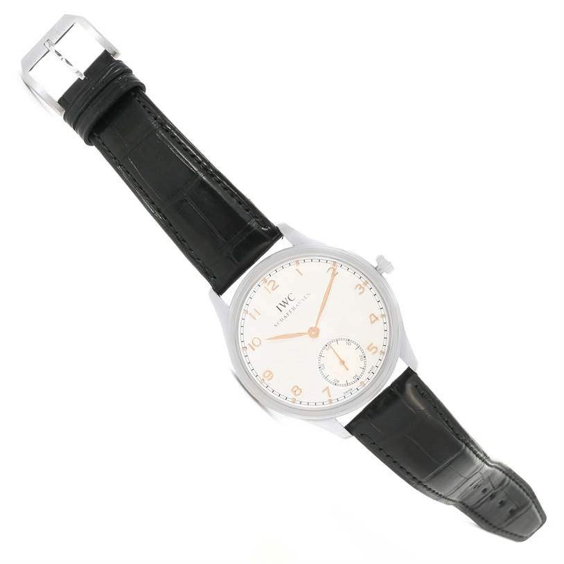 The IWC Portuguese IW545405 Men's Stainless Steel Silver Dial IW545405 Men's Stainless Steel Silver Dial watch is displayed at an angle showing the face, dial, hands, strap, and buckle.