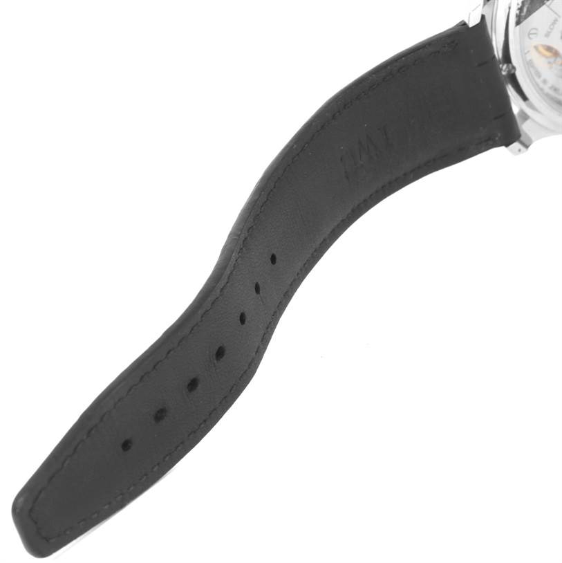 The image shows a side angle of the leather strap and part of the dial of an IWC Portuguese IW545405 Men's Stainless Steel Silver Dial IW545405 Men's Stainless Steel Silver Dial model watch.