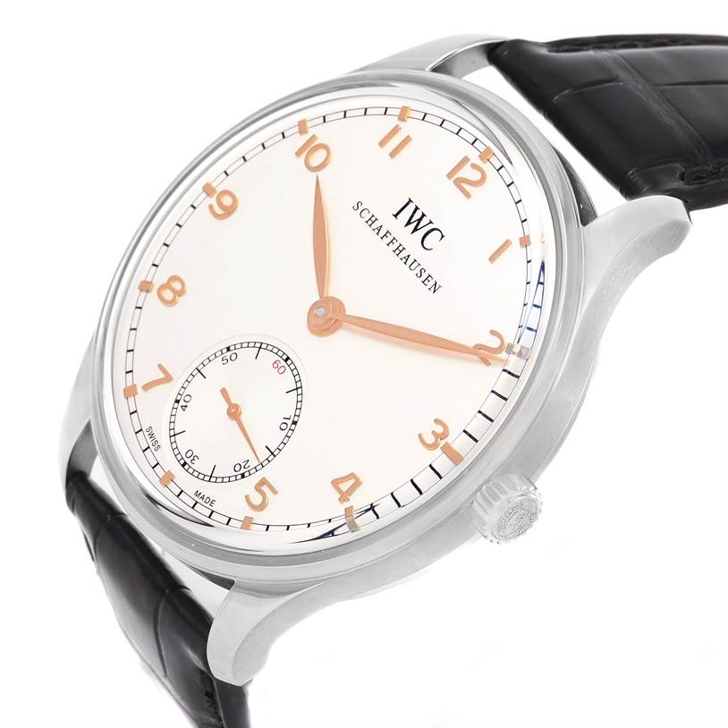 An angled side view of the IWC Portuguese IW545405 Men's Stainless Steel Silver Dial IW545405 Men's Stainless Steel Silver Dial model watch, showing the face, crown, and part of the black leather strap.