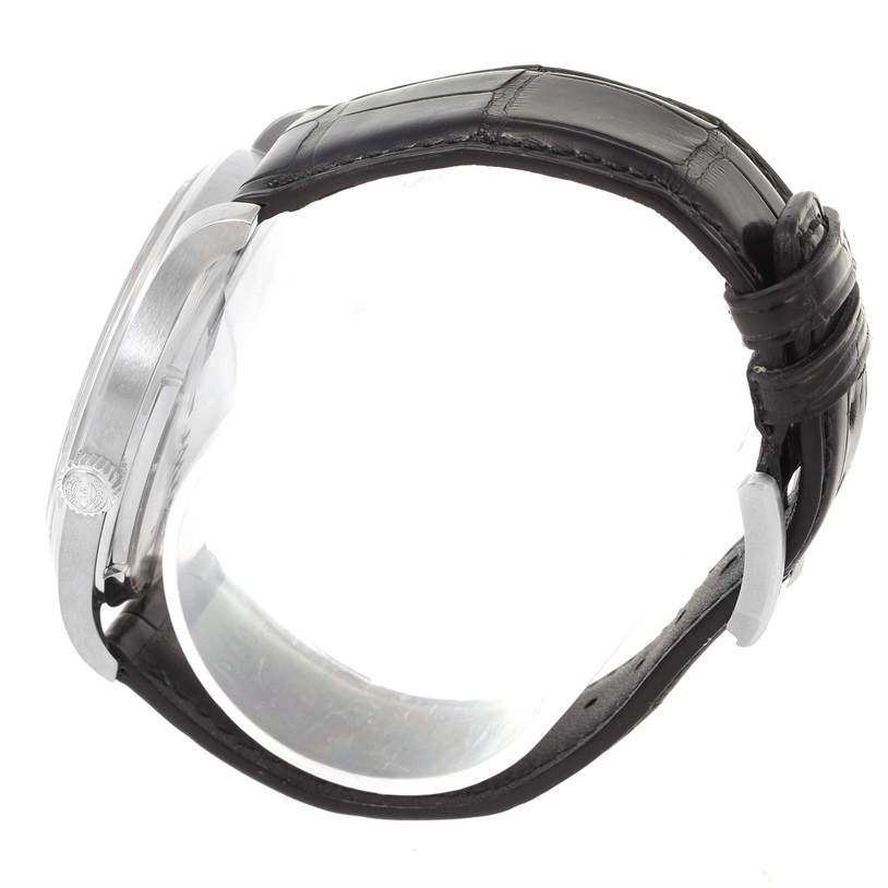 The image shows a side view of the IWC Portuguese IW545405 Men's Stainless Steel Silver Dial IW545405 Men's Stainless Steel Silver Dial model, highlighting its black leather strap and metal case.