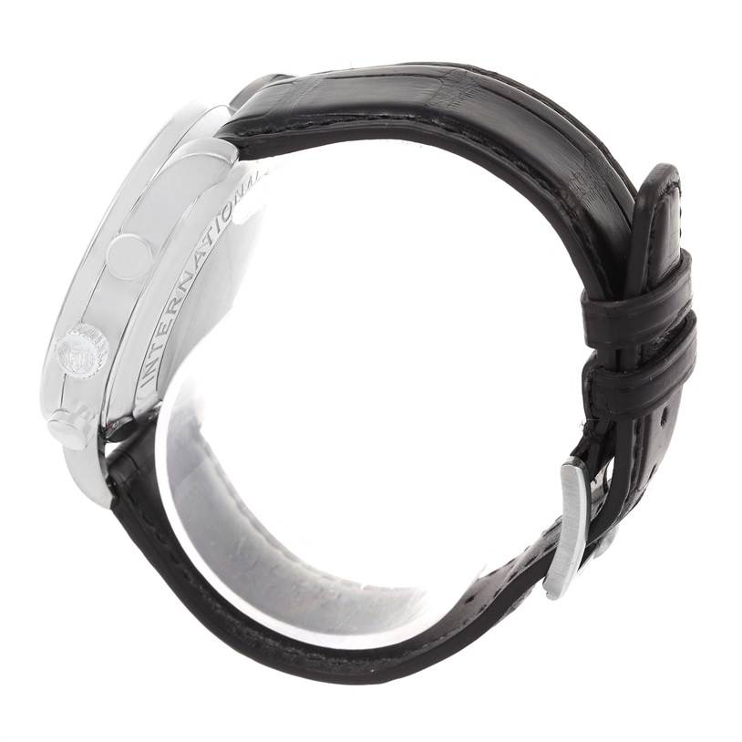 Side view of the IWC Portuguese IW371401 Men's Stainless Steel Silver Dial IW371401 Men's Stainless Steel Silver Dial watch, showing the crown, case, and black leather strap with a buckle.