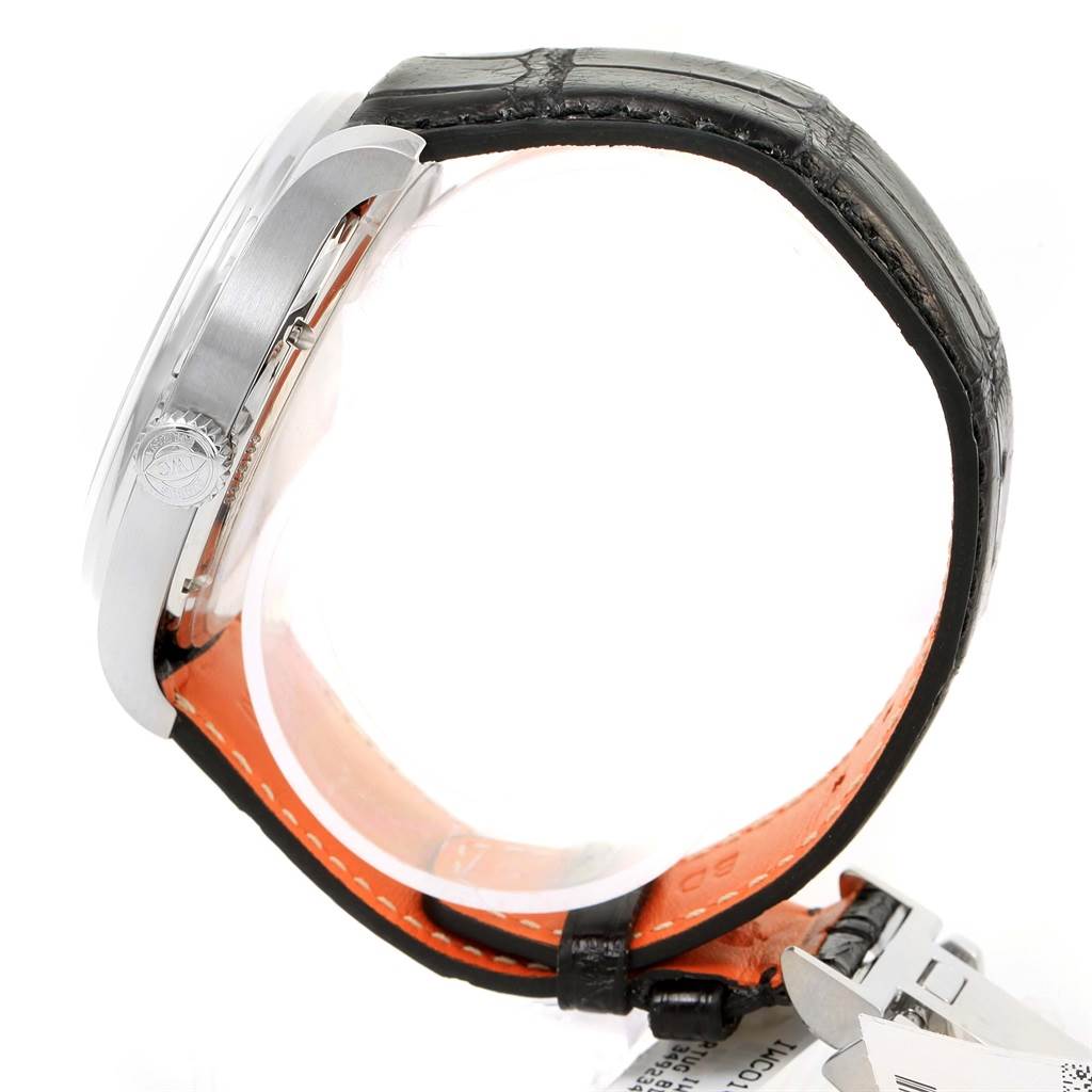 This is a side view of an IWC Portuguese IW510202 Men's Stainless Steel Black Dial IW510202 Men's Stainless Steel Black Dial model watch, showing the case, crown, and leather strap.