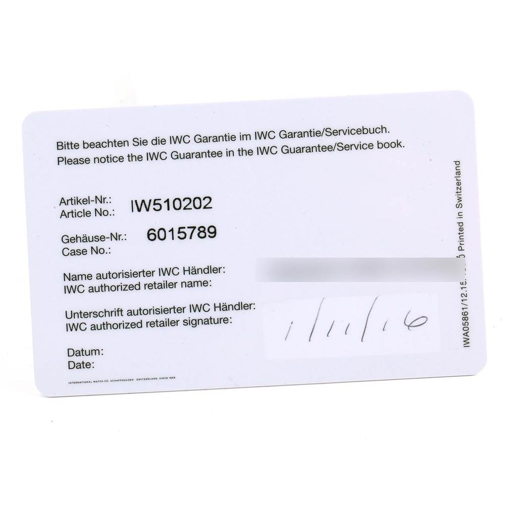 The image shows a warranty card for the IWC Portuguese IW510202 Men's Stainless Steel Black Dial IW510202 Men's Stainless Steel Black Dial model watch, displaying the article and case numbers.