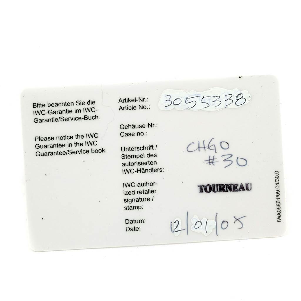 This image shows the warranty card for the Pilot model by IWC, including fields for article number, case number, and retailer stamp.