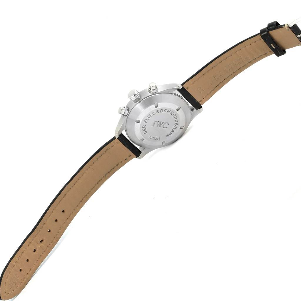 The image shows the back of the IWC Pilot IW370603 Men's Stainless Steel Black Dial IW370603 Men's Stainless Steel Black Dial model watch, focusing on the case back and the leather strap.