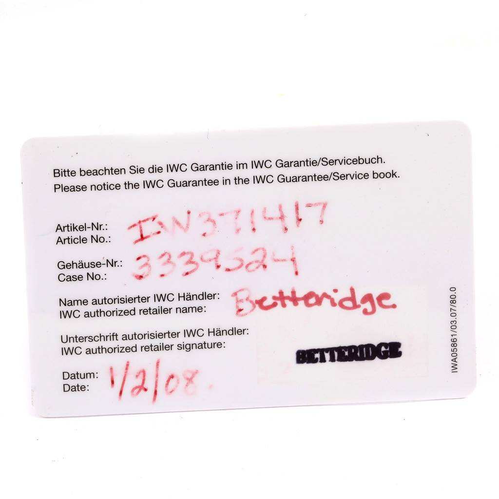 The image shows an IWC Portuguese IW371417 Men's Stainless Steel Silver Dial IW371417 Men's Stainless Steel Silver Dial model warranty card, displaying article and case numbers and retailer information.