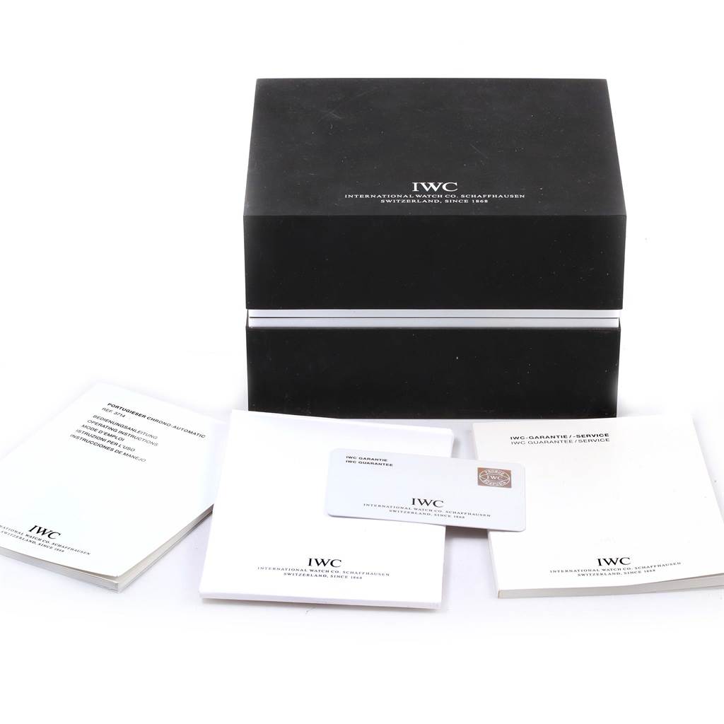 The image shows the packaging box, manuals, and warranty card for the IWC Portuguese IW371417 Men's Stainless Steel Silver Dial IW371417 Men's Stainless Steel Silver Dial model from a front angle.