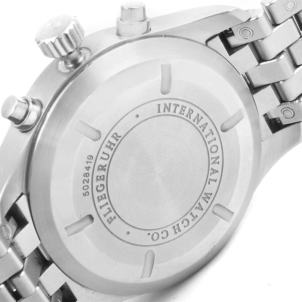 The image shows the back case, crown, pushers, and part of the bracelet of the IWC Pilot IW377704 Men's Stainless Steel Black Dial IW377704 Men's Stainless Steel Black Dial model watch.