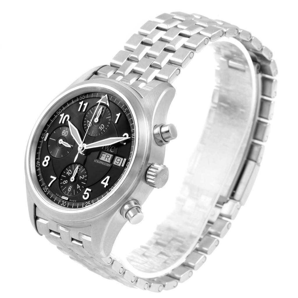 The IWC Pilot IW370618 Men's Stainless Steel Black Dial IW370618 Men's Stainless Steel Black Dial model watch is shown at a slight angle, highlighting the dial, buttons, and metal bracelet.