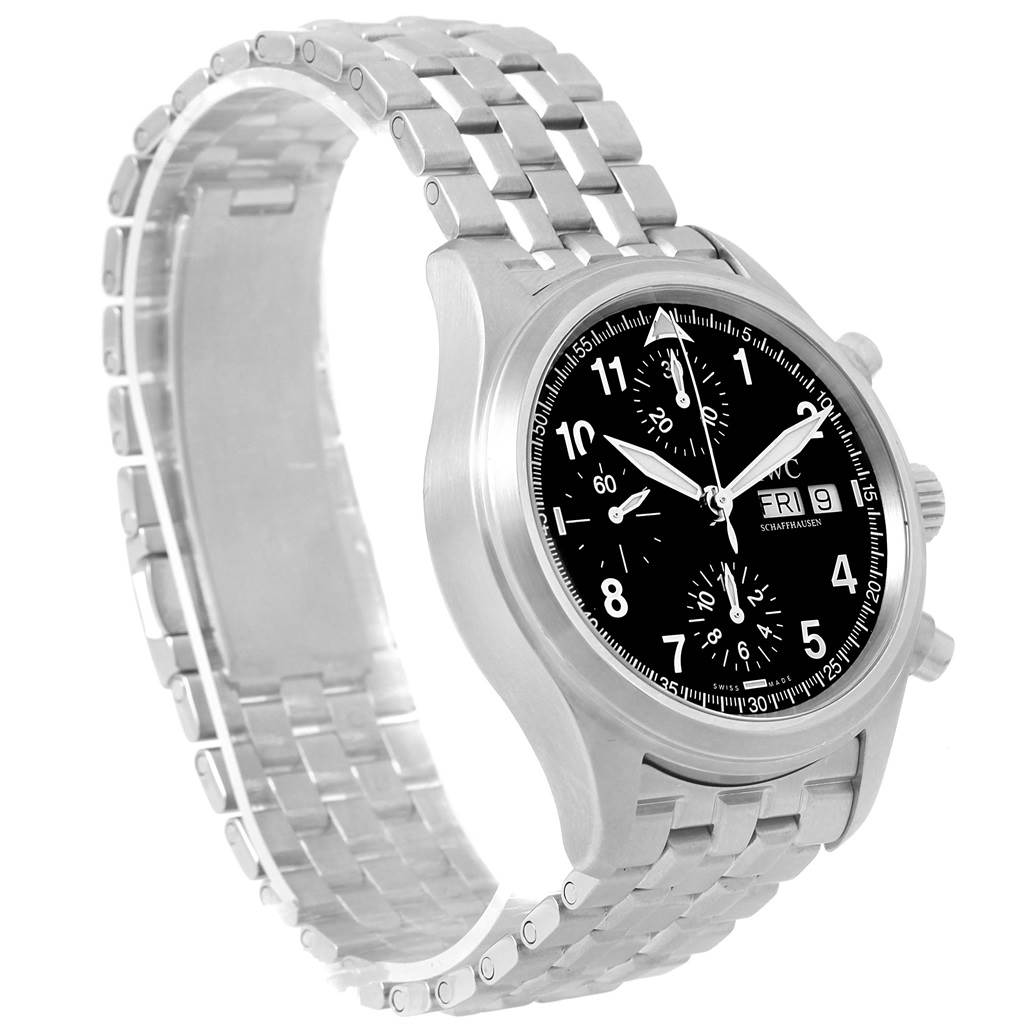 The image shows an angled view of the IWC Pilot IW370618 Men's Stainless Steel Black Dial IW370618 Men's Stainless Steel Black Dial watch, highlighting its face, crown, and metal bracelet.