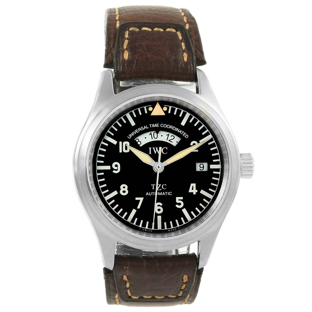 The image shows a front view of the IWC Pilot IW325102 Men's Stainless Steel Black Dial IW325102 Men's Stainless Steel Black Dial watch, highlighting its black dial, silver bezel, and brown leather strap.