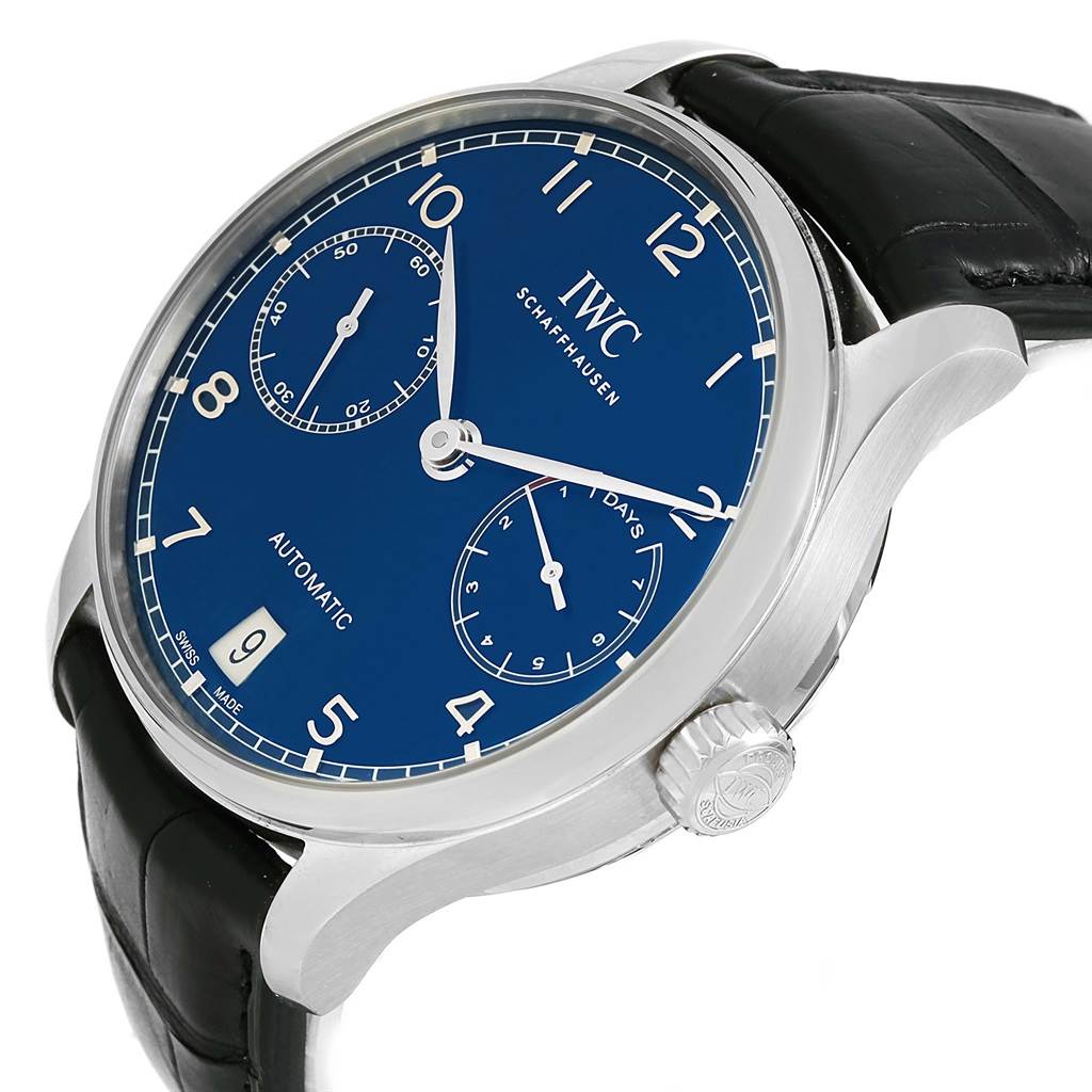 This image shows a close-up side angle of the IWC Portuguese IW500710 Men's Stainless Steel Blue Dial IW500710 Men's Stainless Steel Blue Dial watch, highlighting its blue dial, crown, and black leather strap.