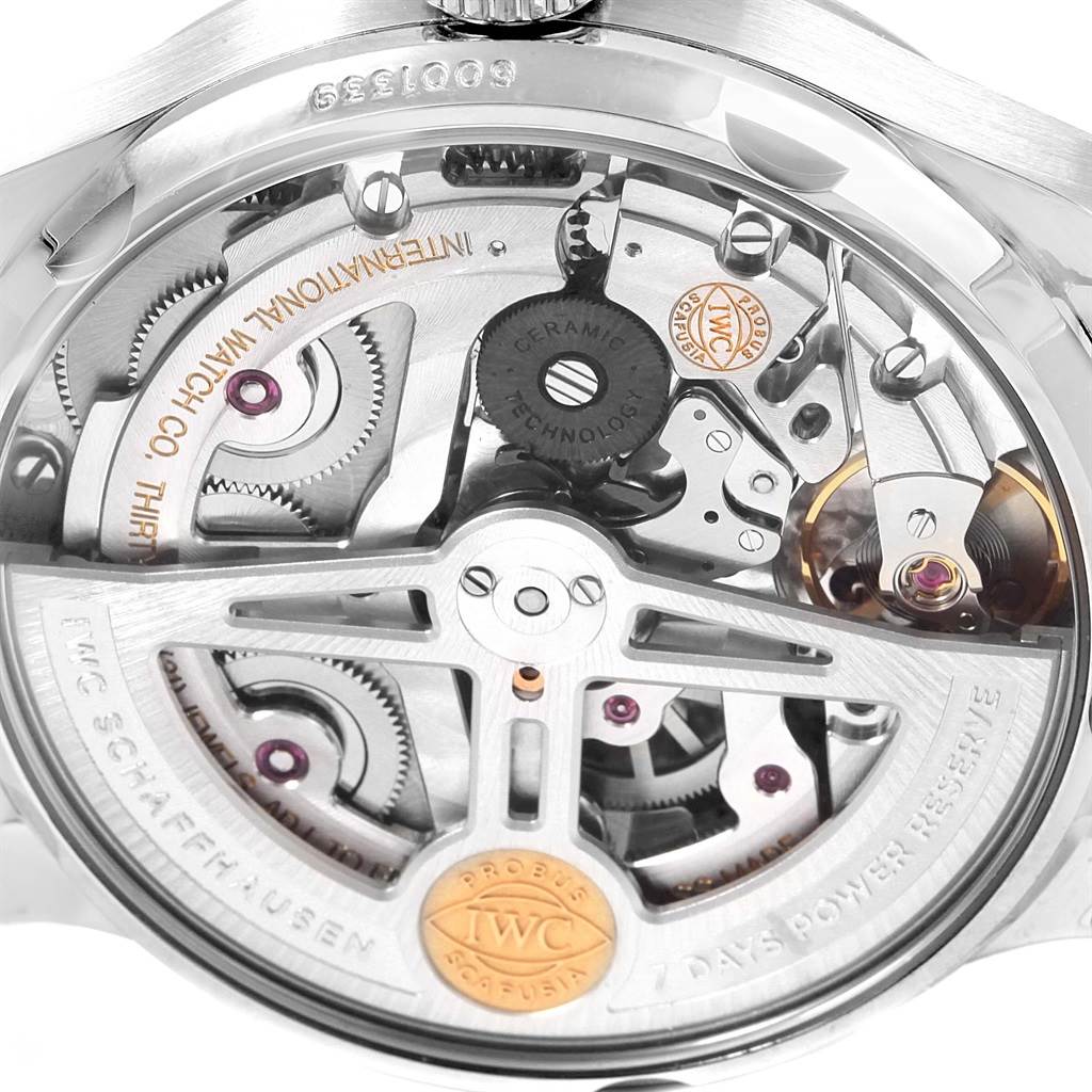 The image shows the intricate back mechanism of the IWC Portuguese IW500710 Men's Stainless Steel Blue Dial IW500710 Men's Stainless Steel Blue Dial watch model, highlighting its inner workings and components.