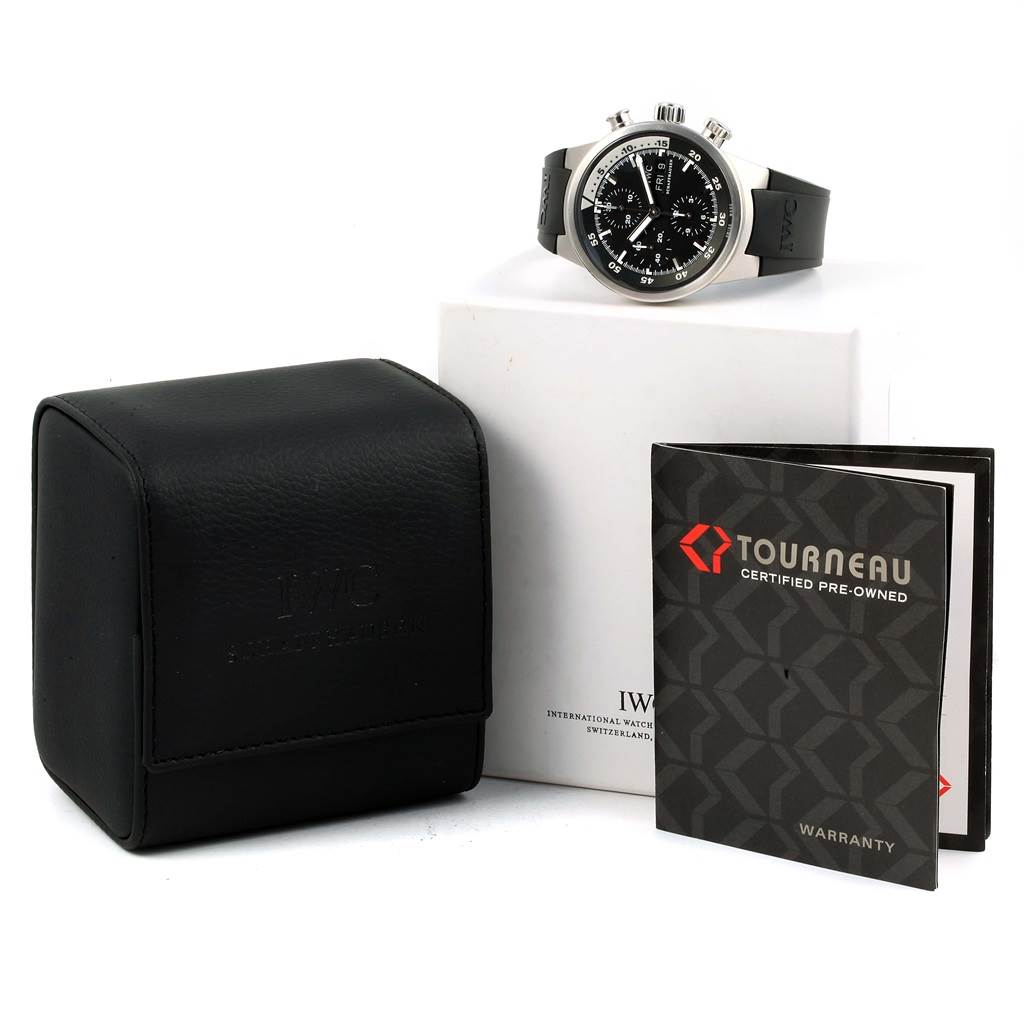 The image shows an IWC Aquatimer IW371933 Men's Stainless Steel Black Dial IW371933 Men's Stainless Steel Black Dial watch displayed at an angle, along with its black case, documentation, and warranty card.