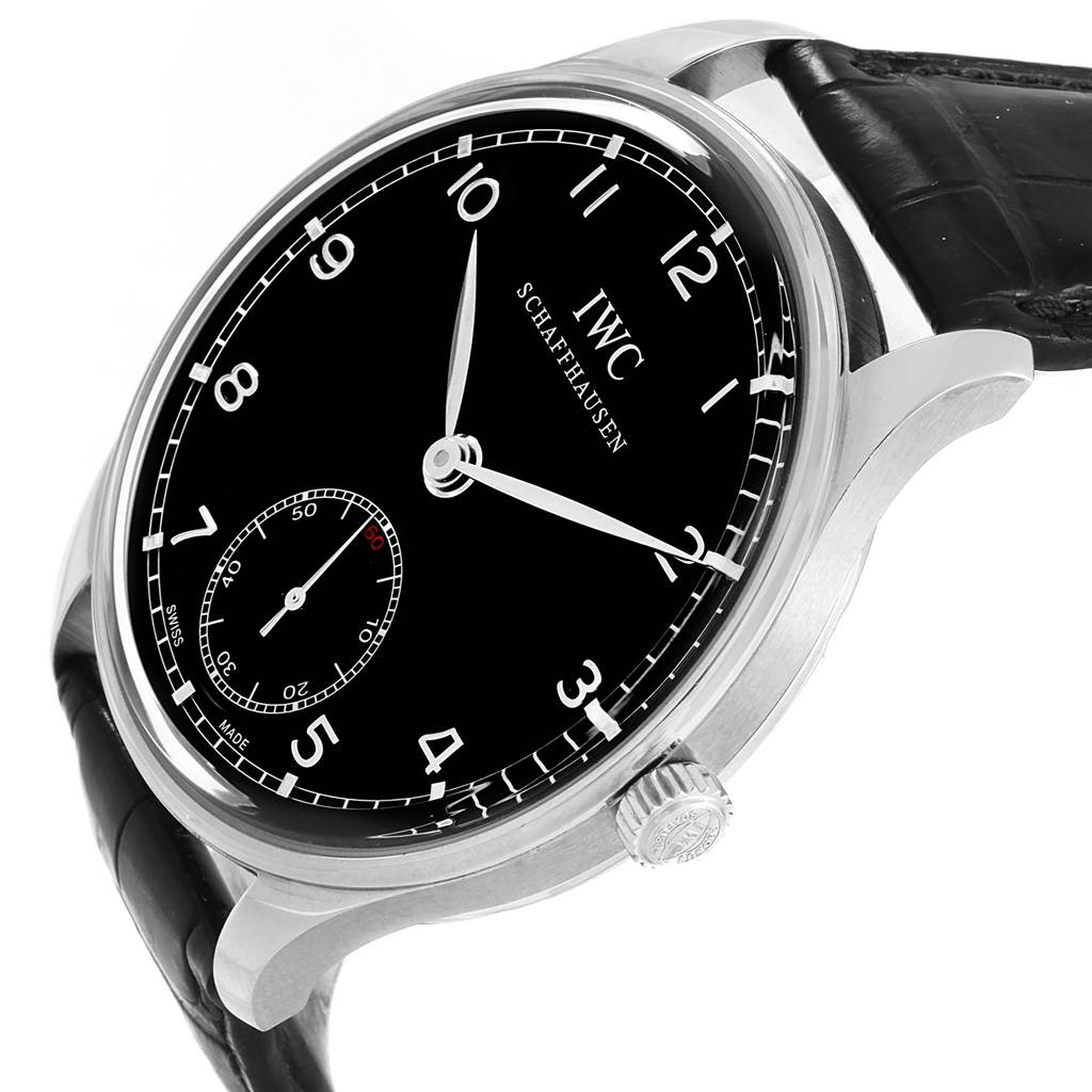 The image shows an IWC Portuguese IW545407 Men's Stainless Steel Black Dial IW545407 Men's Stainless Steel Black Dial model watch from a tilted angle, highlighting the black dial, crown, and part of the strap.