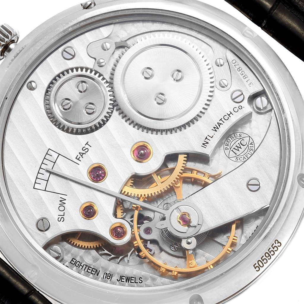 The image shows a close-up of the movement and internal mechanisms of the IWC Portuguese IW545407 Men's Stainless Steel Black Dial IW545407 Men's Stainless Steel Black Dial watch from the back.