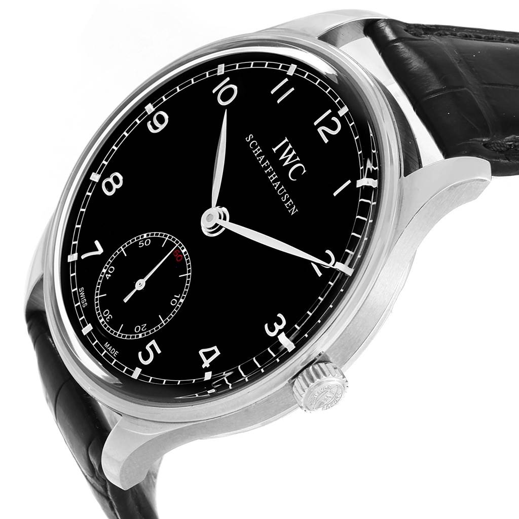 The IWC Portuguese IW545407 Men's Stainless Steel Black Dial IW545407 Men's Stainless Steel Black Dial model watch is shown at an angled close-up view, displaying the dial, crown, and part of the strap.