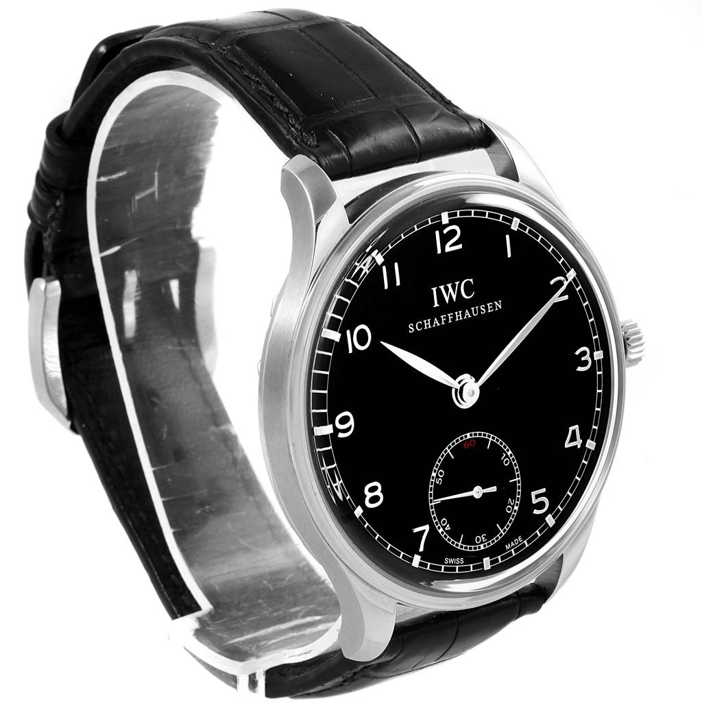 This image shows an IWC Portuguese IW545407 Men's Stainless Steel Black Dial IW545407 Men's Stainless Steel Black Dial model watch from a slight side angle, highlighting its black dial and leather strap.