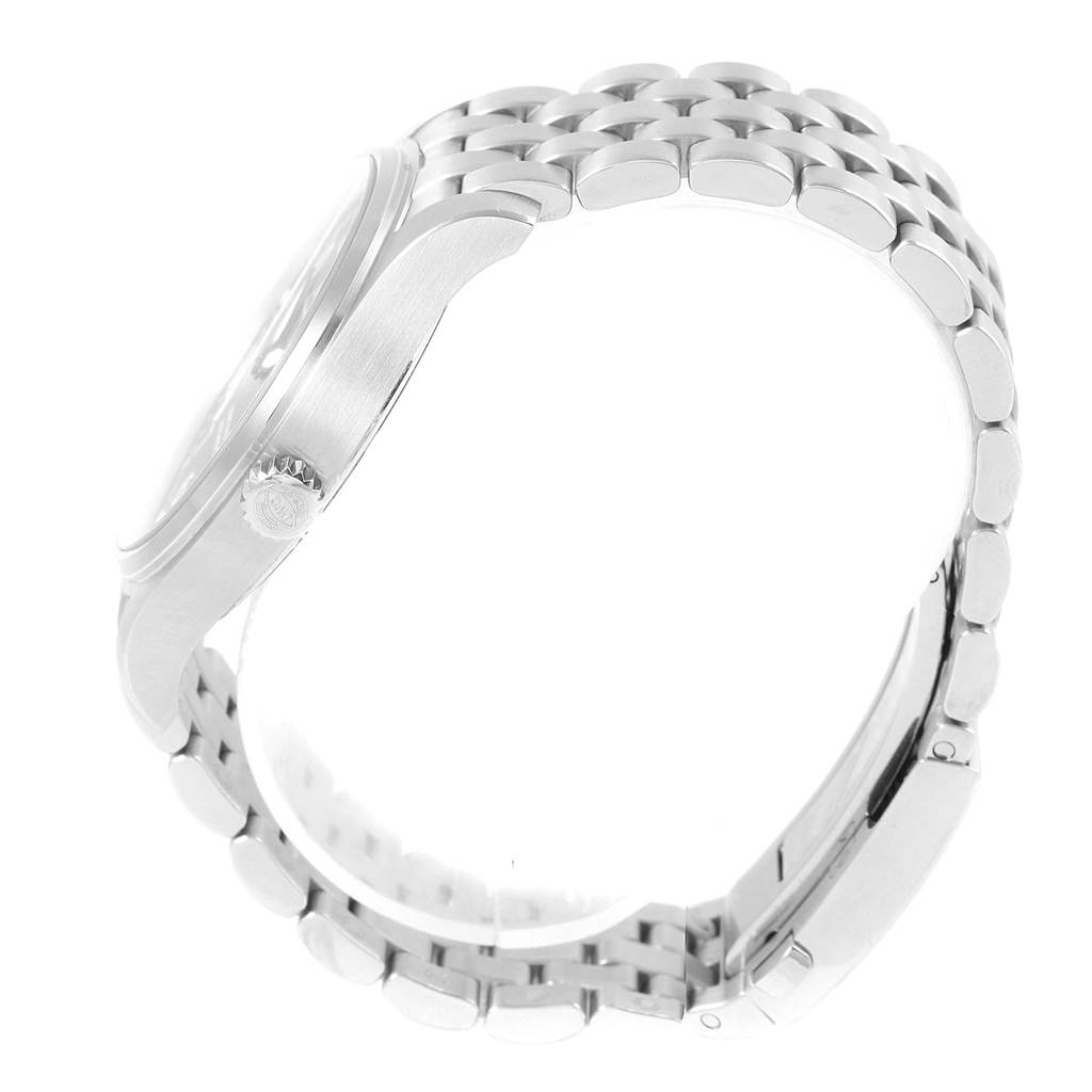 The image shows a side view of the IWC Pilot IW327011 Men's Stainless Steel Black Dial IW327011 Men's Stainless Steel Black Dial watch, focusing on the crown, case, and metal bracelet.