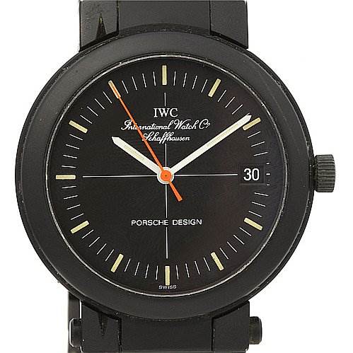 The image shows the front view of a Vintage IWC Porsche Design watch, displaying the dial, hands, and part of the strap.