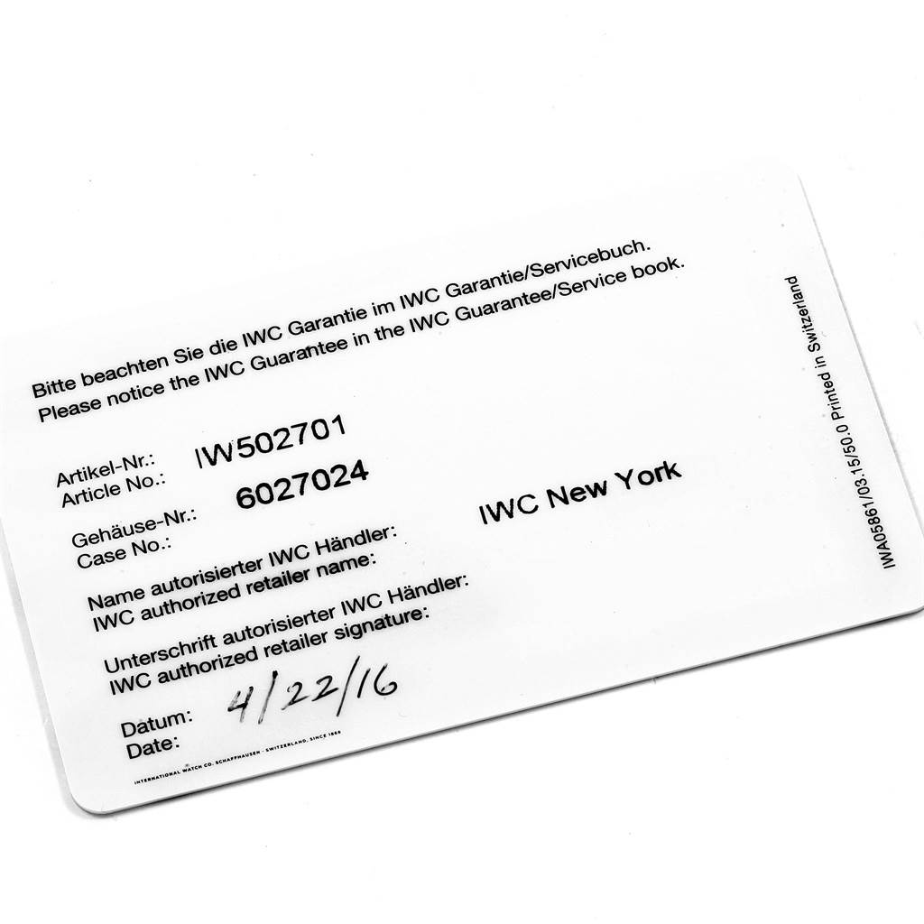 This image shows a warranty card for an IWC Pilot IW502701 Men's Rose Gold Blue Dial IW502701 Men's Rose Gold Blue Dial model watch, detailing article, case number, and retailer information.