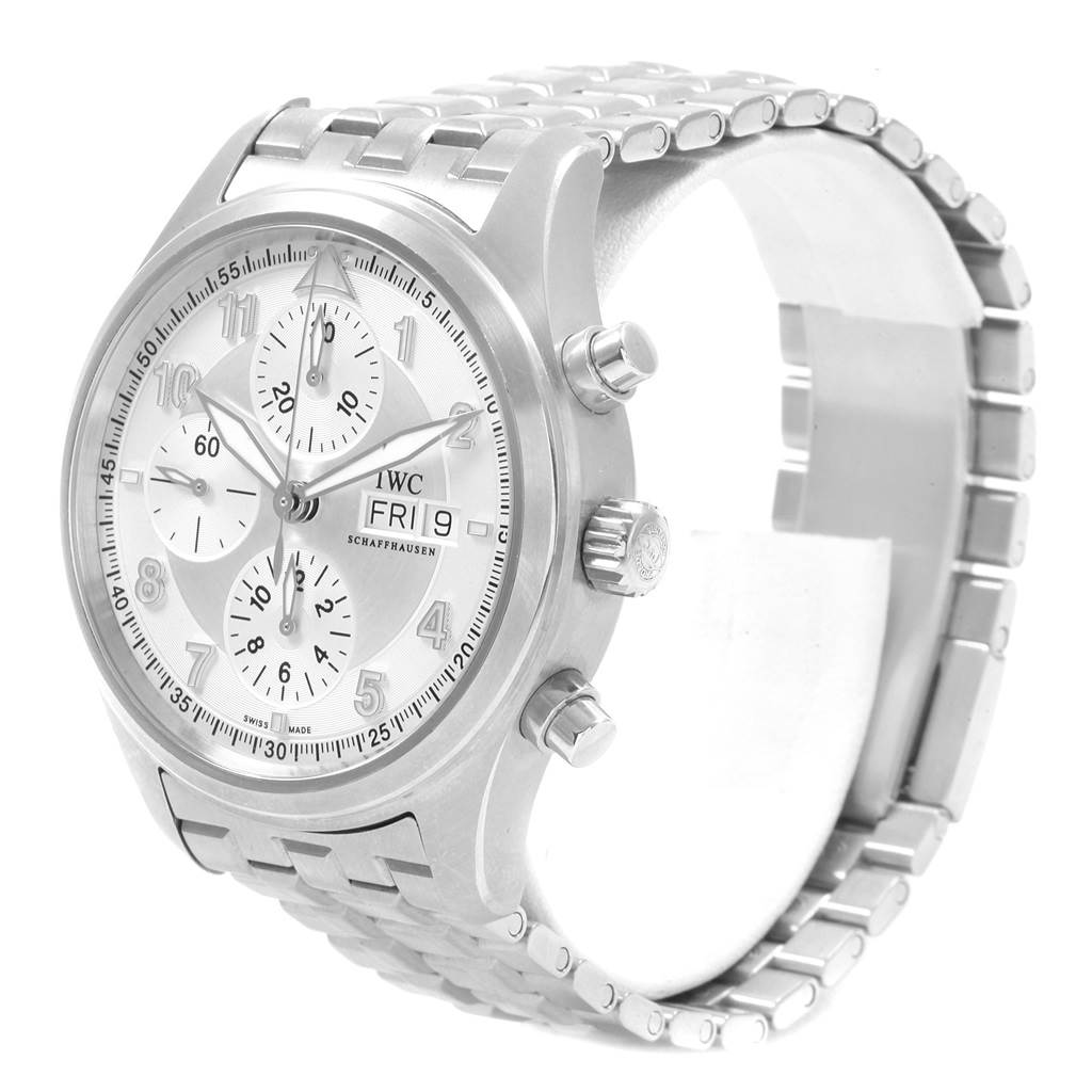 The watch is an IWC Pilot IW371705 Men's Stainless Steel Silver Dial IW371705 Men's Stainless Steel Silver Dial model, shown at a three-quarter angle, highlighting the face, side buttons, and metal bracelet.